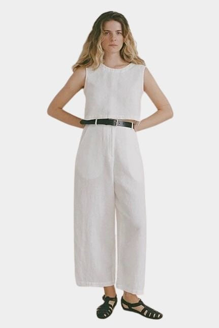 Shaina Mote Paradis trouser in natural organic cotton front view with high rise, straight leg and black belt styling