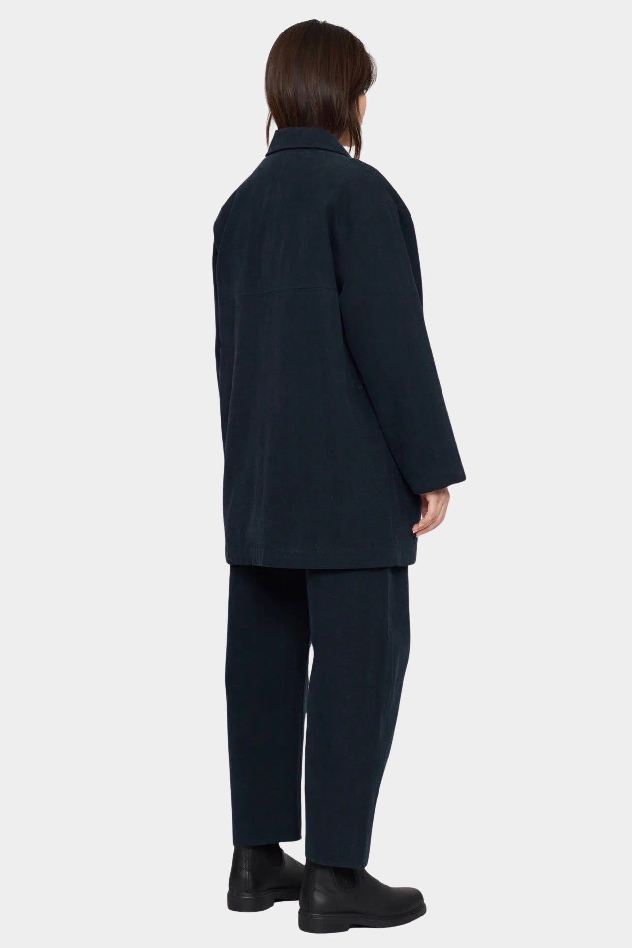 7115 by Szeki Mid-Length Chore Coat Navy angled back view showing the collar and rear seam.