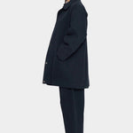 7115 by Szeki Mid-Length Chore Coat Navy side view showing relaxed fit and inset pocket.