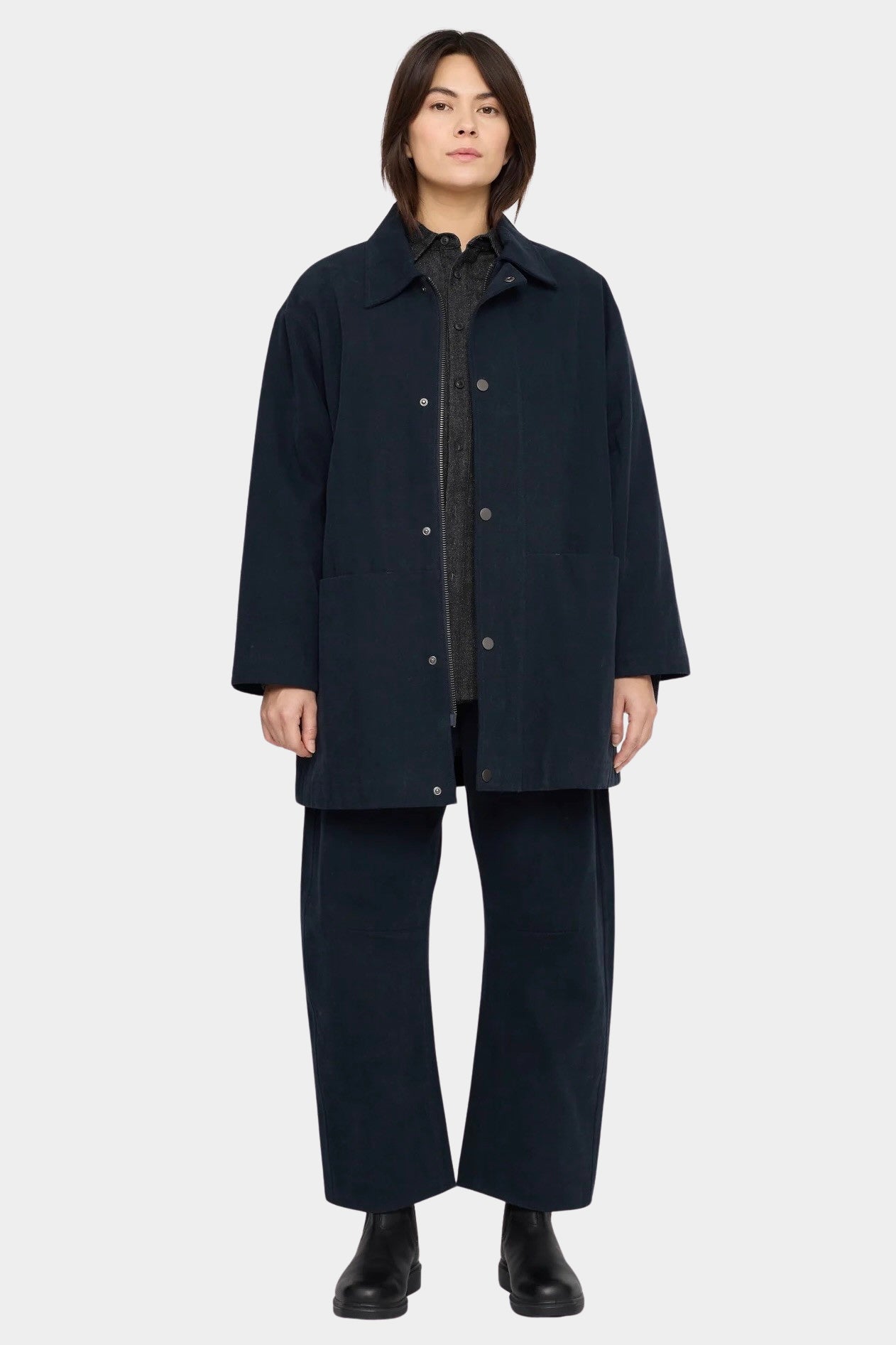 7115 by Szeki Mid-Length Chore Coat Navy front view worn open over a shirt at YUCCA Denver.