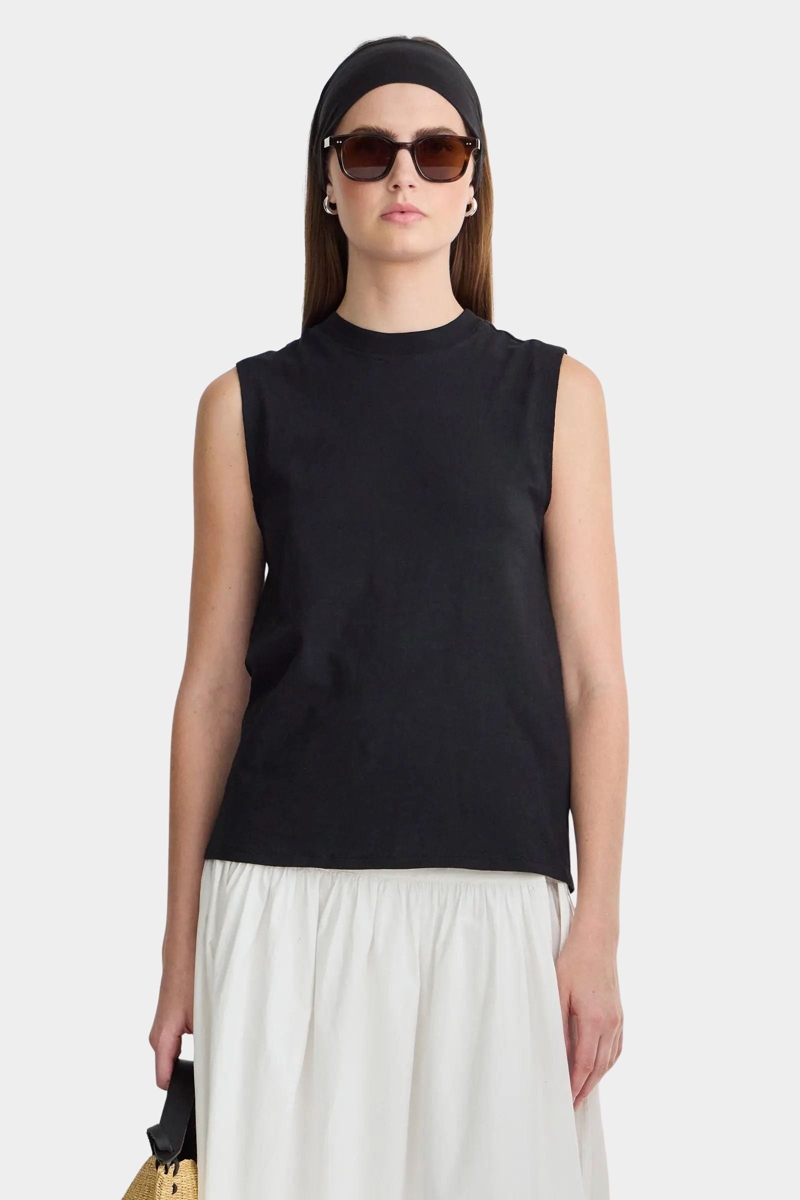 Apiece Apart Forte Tee Black front view with structured sleeveless silhouette and organic cotton muscle tee styling