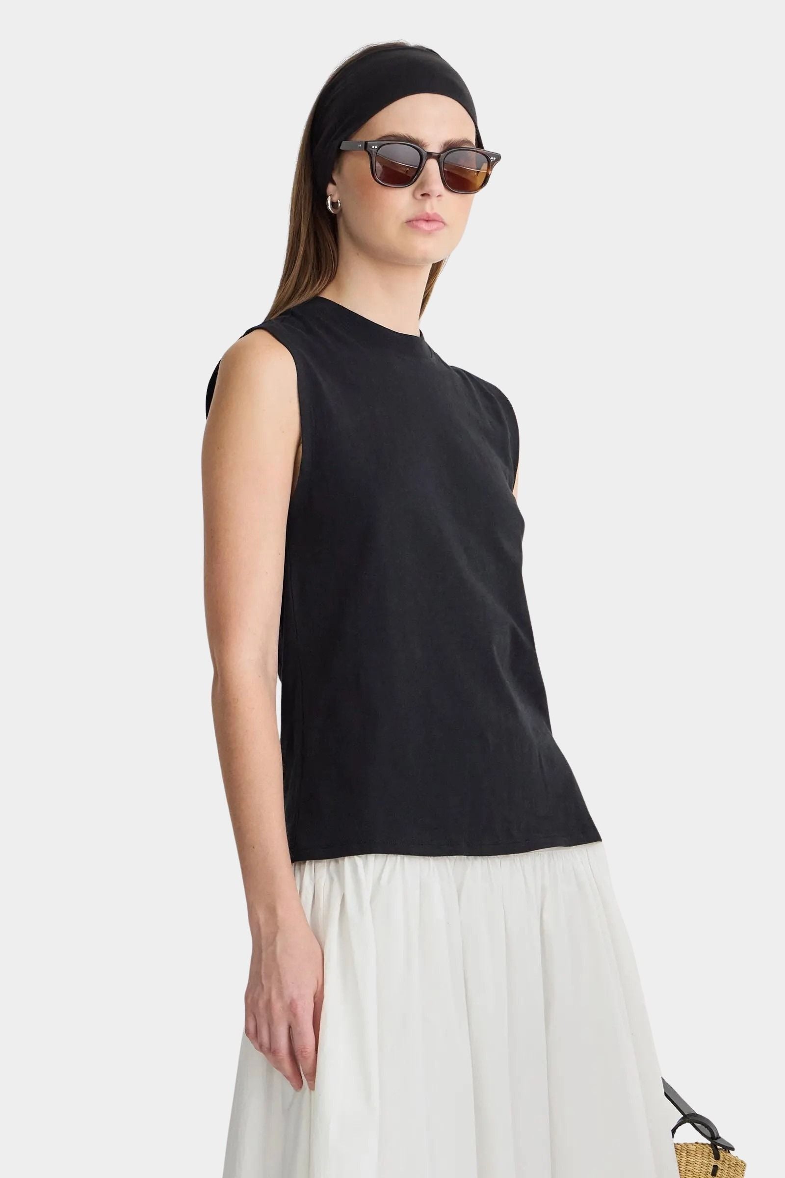 Apiece Apart Forte Tee Black angled side profile with square sleeve detail and elevated everyday silhouette