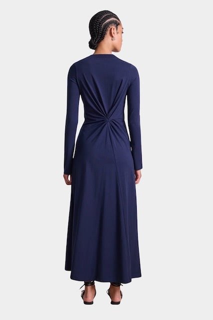 Apiece Apart Long Sleeve Volta Dress in Navy with twist waist detail and midi length at YUCCA Denver