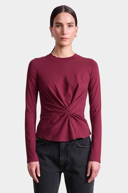 Apiece Apart Long Sleeve Volta Top in Black Cherry with twist front detail styled with black trousers at YUCCA Denver