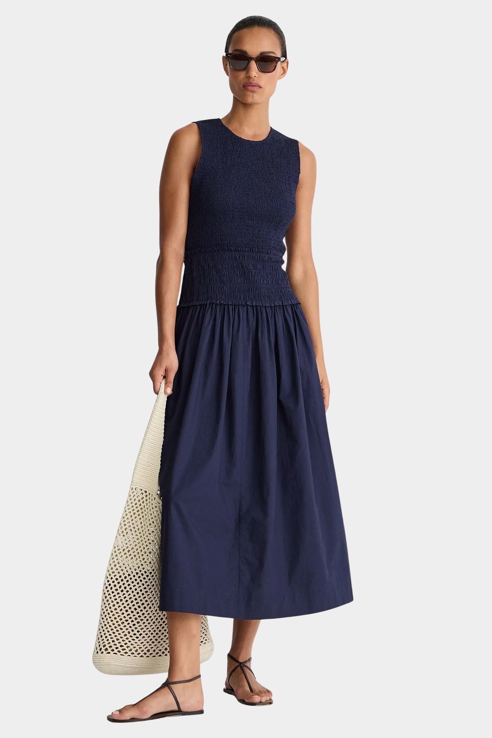 Midnight navy smocked bodice maxi dress sleeveless crew neck organic cotton A-line silhouette full length front view