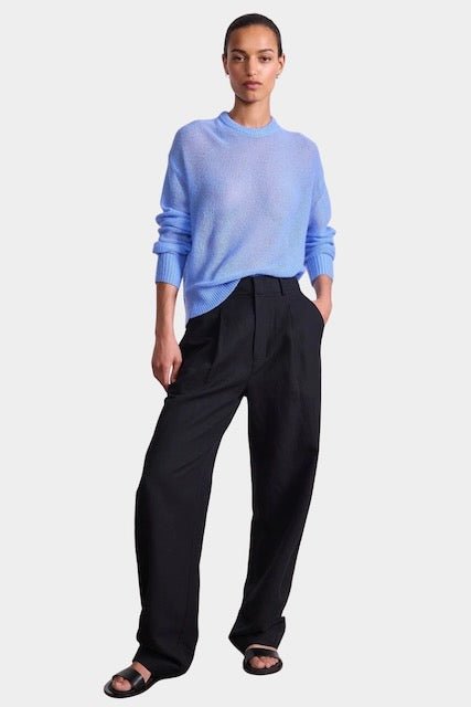 Apiece Apart Softest Tissue Weight Sweater in Cornflower blue cashmere silk knit styled with tailored trousers at YUCCA Denver