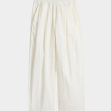 Apiece Apart Spa Pleat Pant Cream product flat lay in lightweight organic cotton with elastic waistband and pleated shape