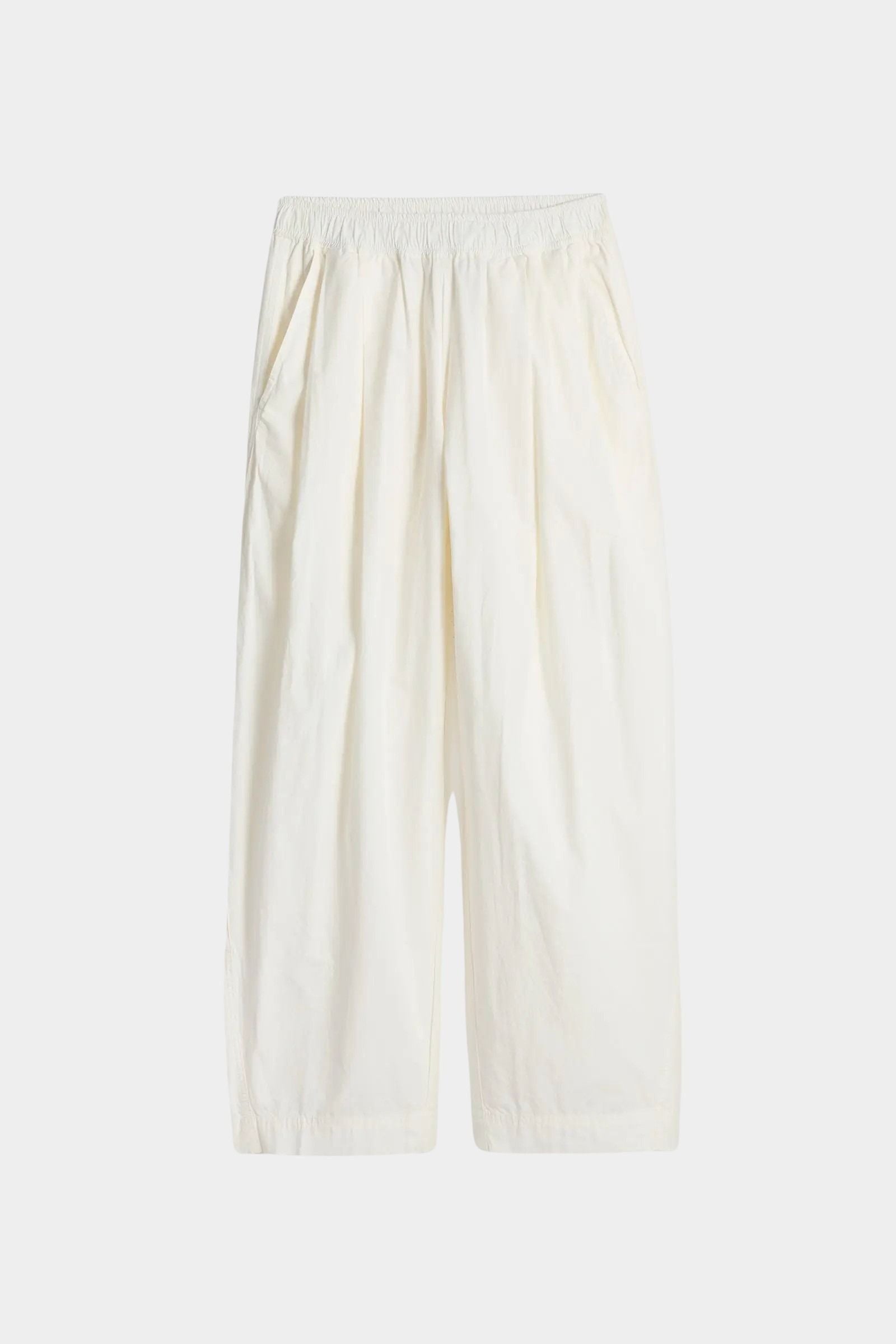 Apiece Apart Spa Pleat Pant Cream product flat lay in lightweight organic cotton with elastic waistband and pleated shape