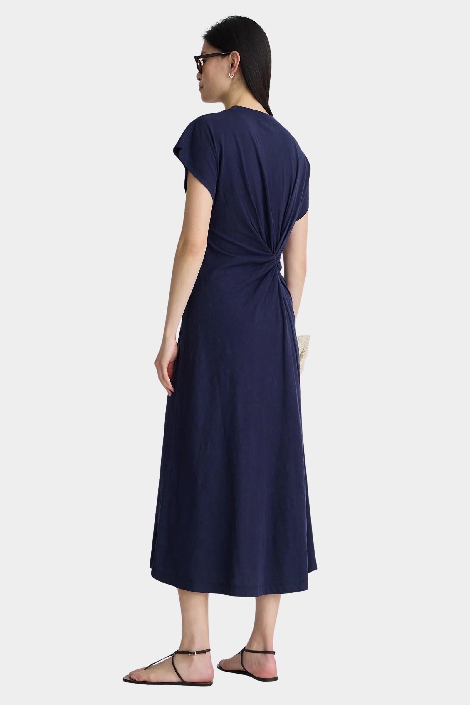 Apiece Apart Volta Twist Dress navy organic cotton twist waist draped midi dress back view