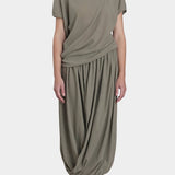Black Crane asymmetric cotton gauze top cement mid length view highlighting fluid drape and silhouette