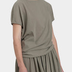 Black Crane asymmetric cotton gauze top cement front detail showing pleat and directional drape