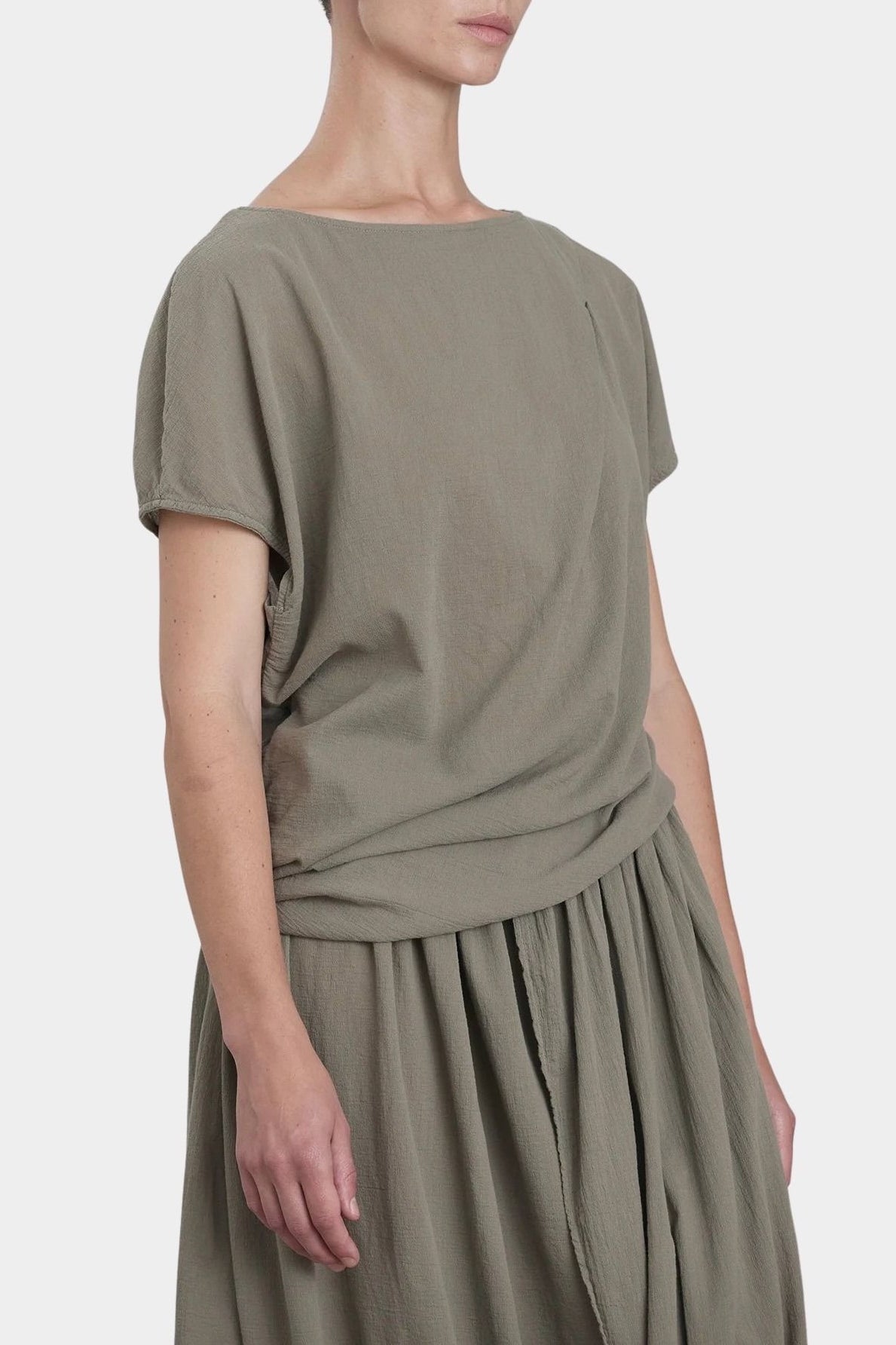 Black Crane asymmetric cotton gauze top cement front detail showing pleat and directional drape
