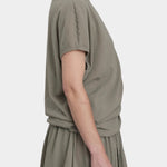 Black Crane asymmetric cotton gauze top cement side profile with relaxed fit and lightweight textu