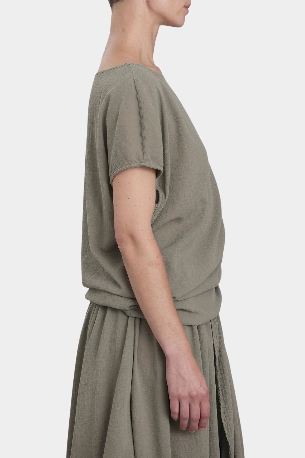 Black Crane asymmetric cotton gauze top cement side profile with relaxed fit and lightweight textu