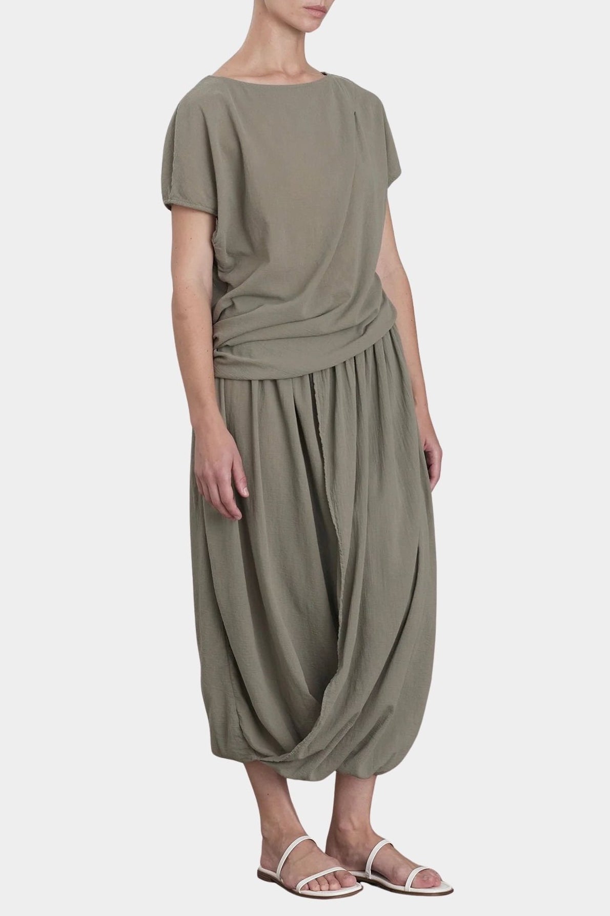 Black Crane asymmetric cotton gauze top in cement on model with sculptural drape and relaxed fit full outfit view