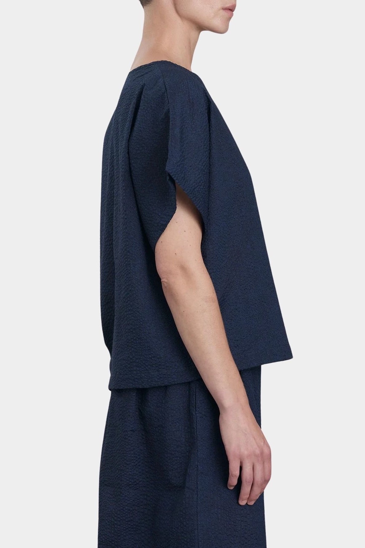 Black Crane Boxed Top Navy side profile minimal silhouette textured fab