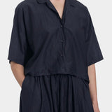 Black Crane cropped shirt faded black close-up of collar and button front detail