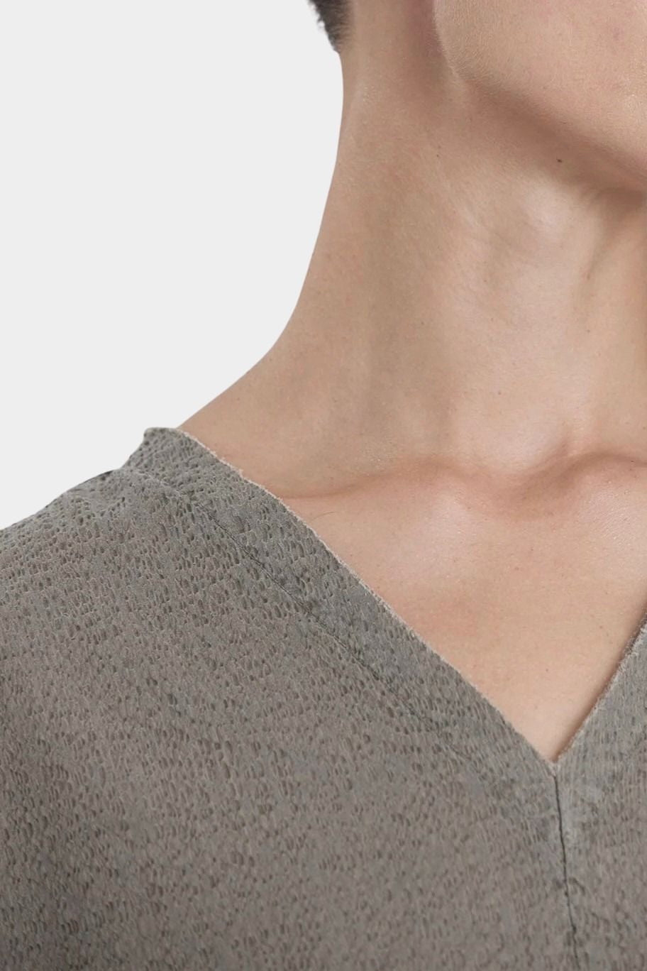 Black Crane v neck dress p grey neckline detail raw edge v neck cotton close up