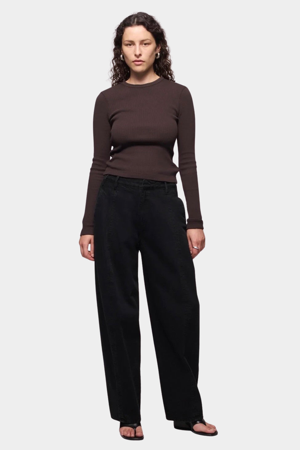 DALA Curve Jeans in One Year Black on model, full front view showing relaxed barrel legs, at YUCCA Denver.