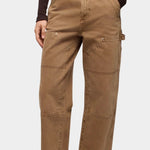 DALA Dove Carpenter Jeans in Oak Brown, close front view showing angled pockets, carpenter panels and frayed hems.