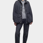 DALA Mountain Jacket in Hurricane, worn open over a gray hoodie with matching denim, from YUCCA Denver.