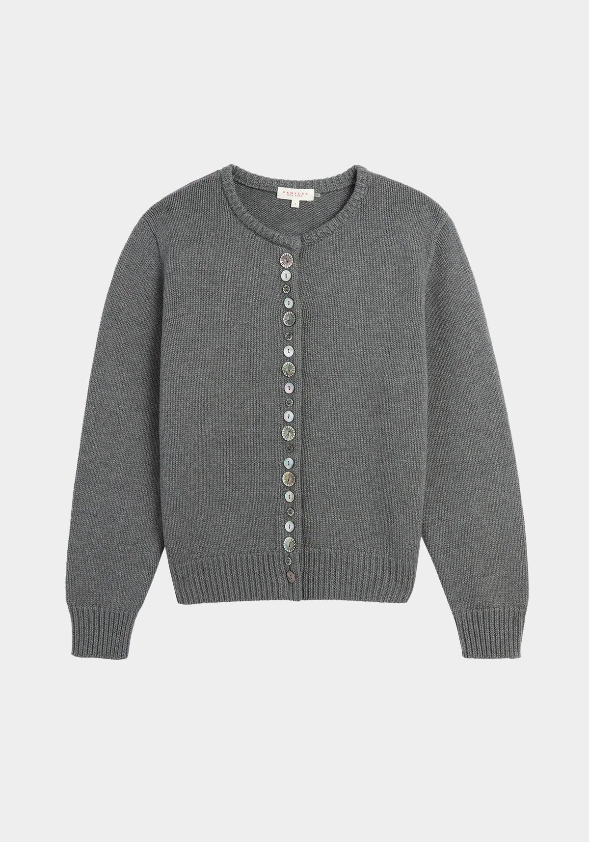 Close view of decorative shell buttons on the charcoal cardigan at YUCCA, a Denver women’s boutique