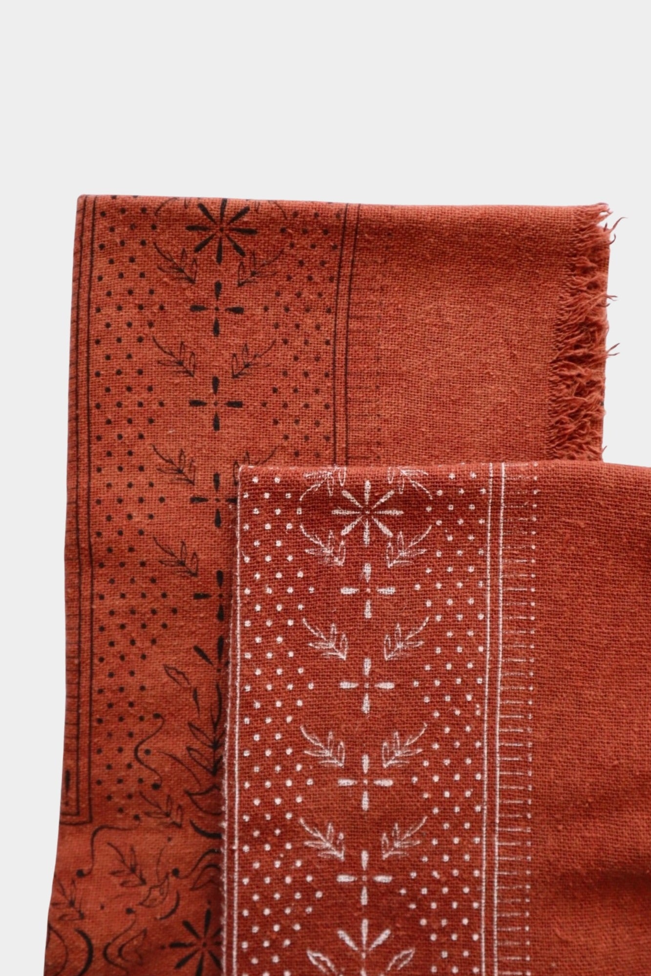 Eco Raw Studio Terracotta Classic Print Naturally Dyed Bandana in Terracotta x White Ink folded to show hand printed pattern