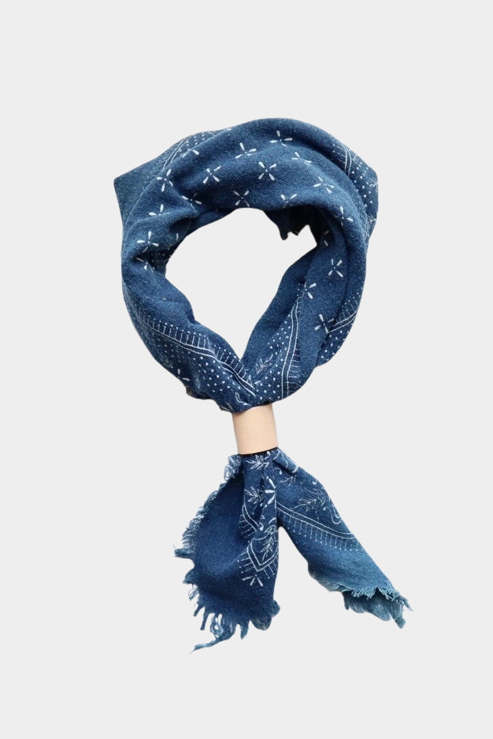 Eco Raw Studio ocean blue raw silk bandana with white print styled knotted on mannequin with frayed edges