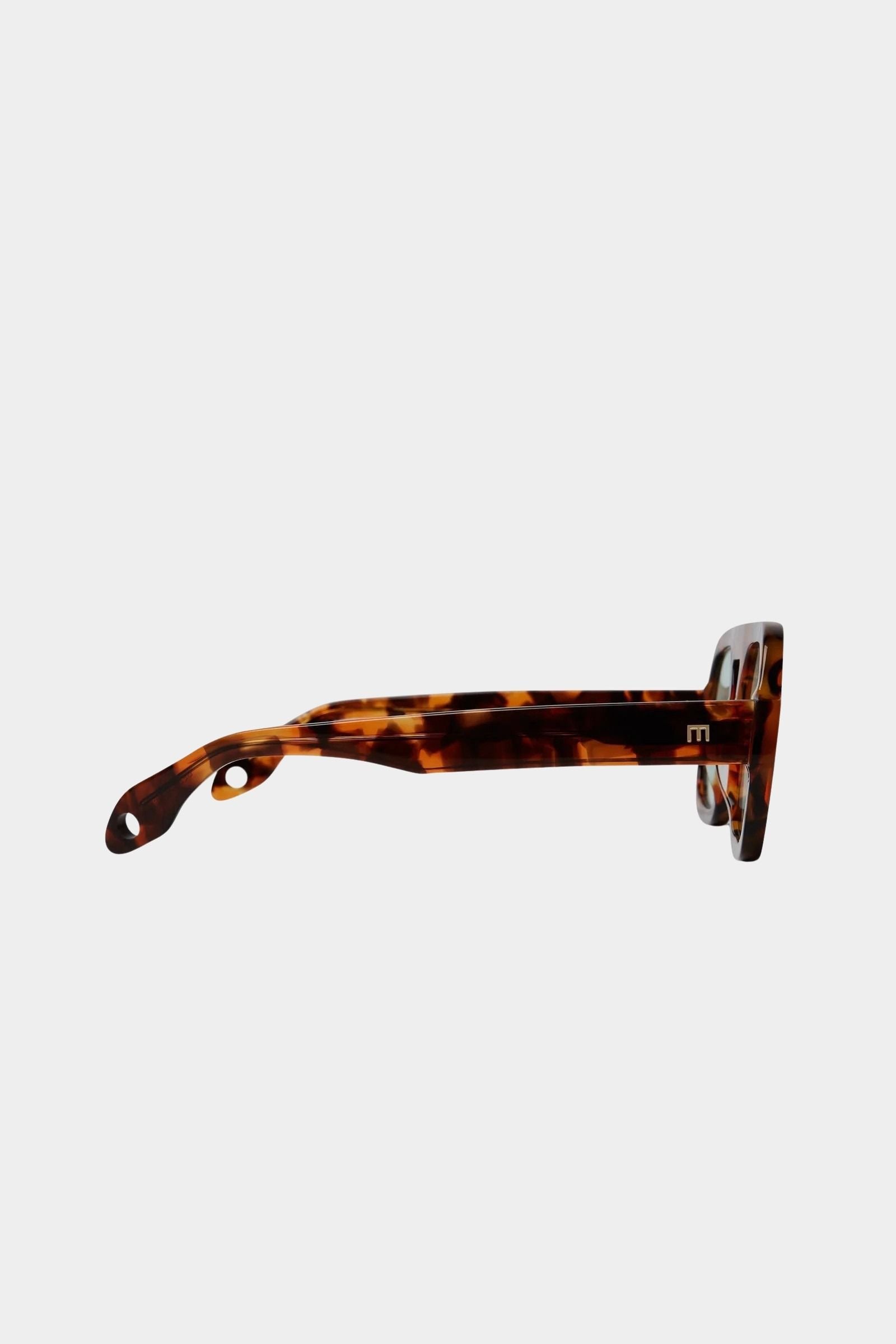 Side profile of Elisa Johnson Jane sunglasses in brown tortoise acetate with thick temples and tinted mint lenses