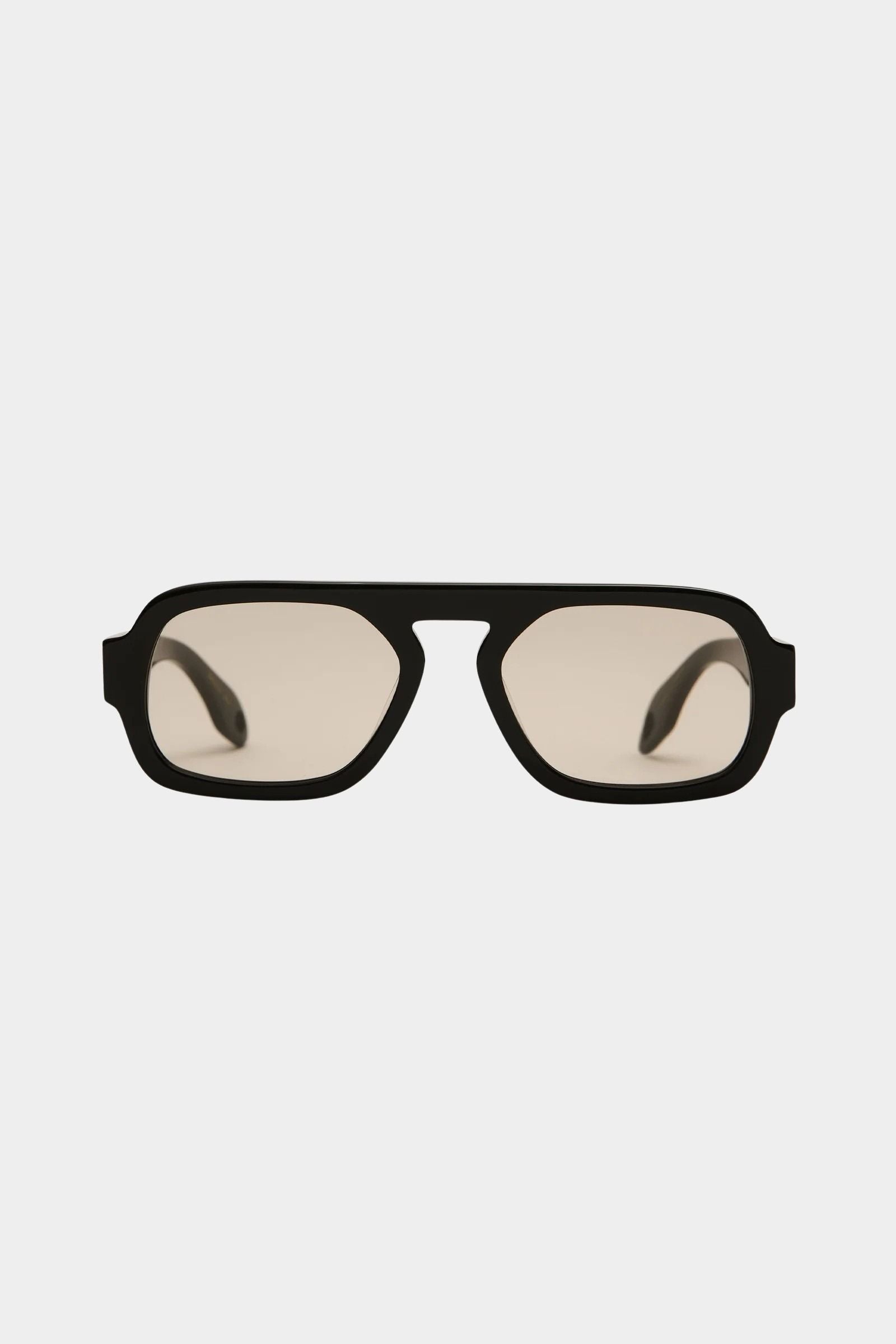 Elisa Johnson Jane Mini sunglasses in gloss black with oversized aviator silhouette and light brown lenses
