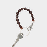 Ina Seifart Perlen Short Keychain Brown wooden beaded keychain with metal clasp