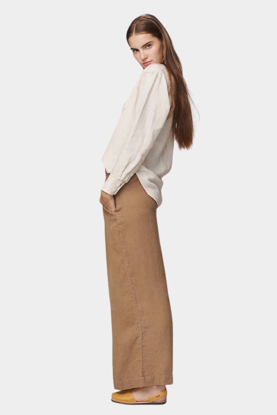 Side view of the Jungmaven Cambria Pant in Coyote showing the drape and wide leg shape at SHOP YUCCA Denver