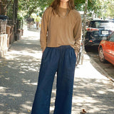 Jungmaven Disco Denim Pant in Dark Wash styled on model with a relaxed fit at YUCCA Denver