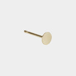 Medium gold disc stud earring with polished post and matte surface.