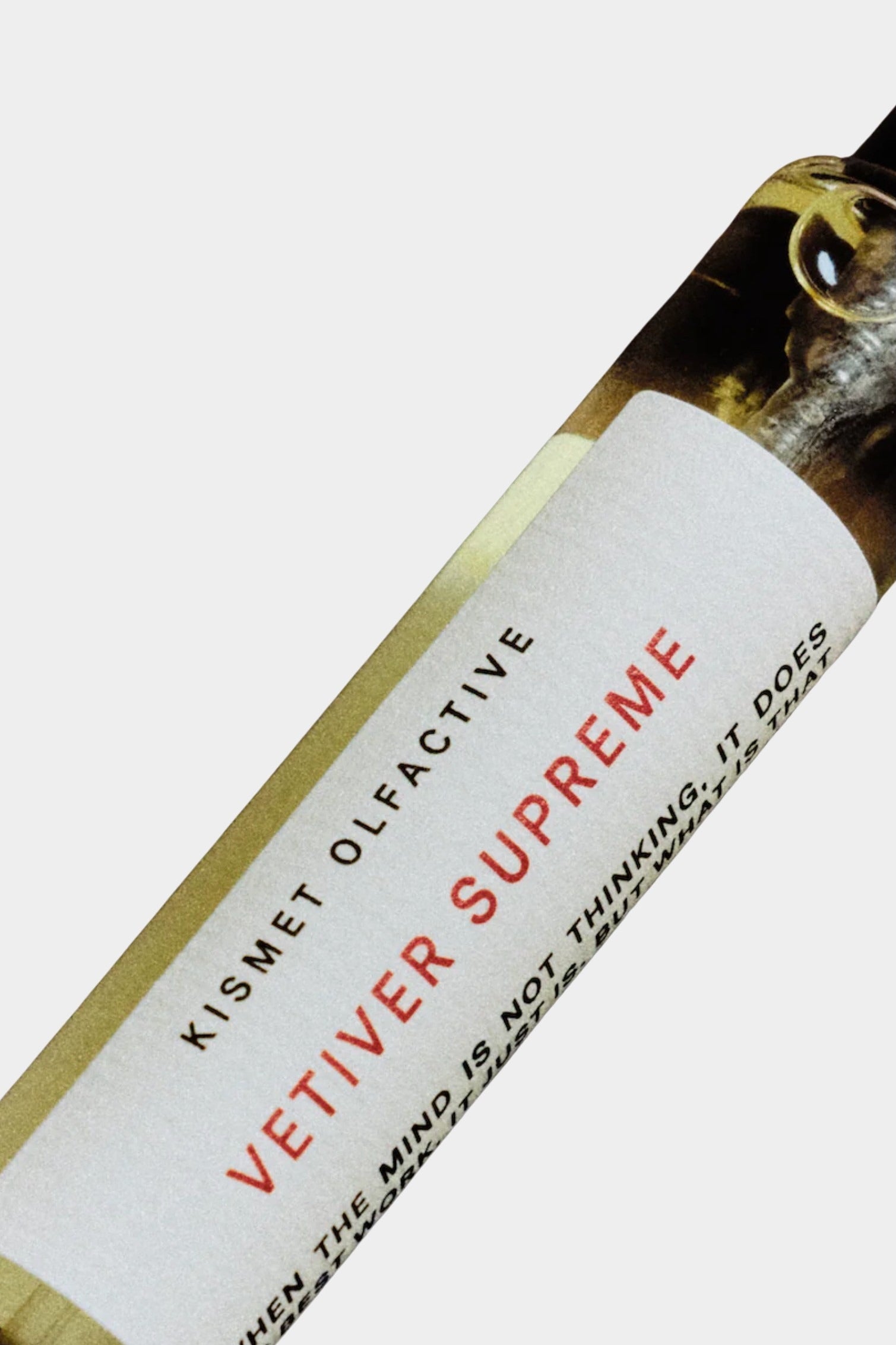 Kismet Olfactive Vetiver Supreme eau de parfum 10ml travel spray close up showing label detail and amber glass