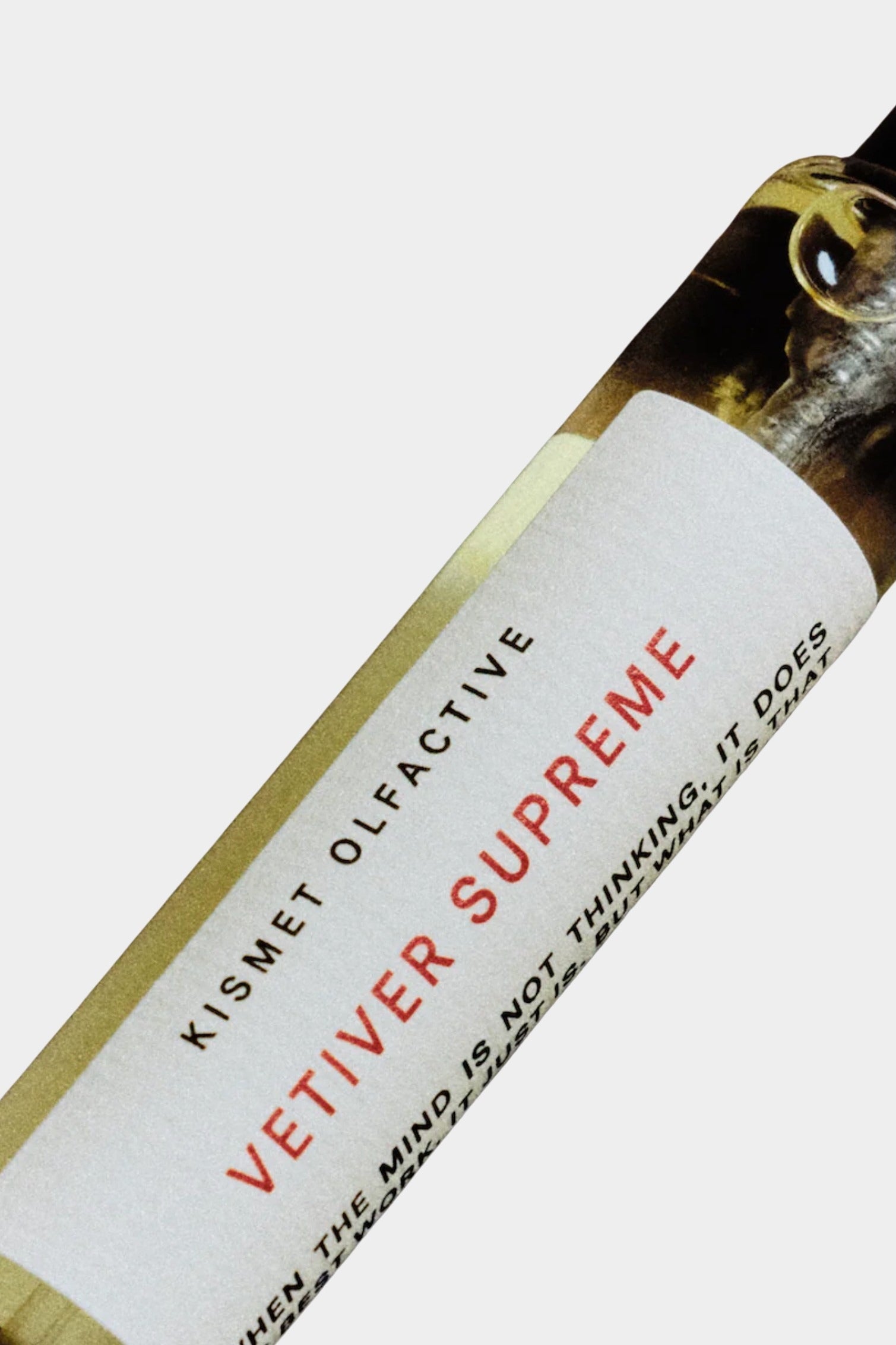 Kismet Olfactive Vetiver Supreme eau de parfum 10ml travel spray close up showing label detail and amber glass