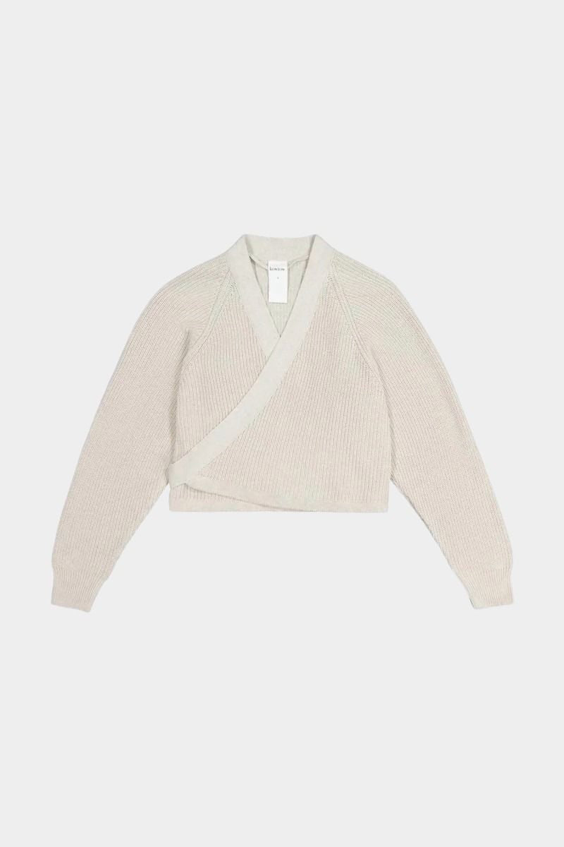 Flat front view of the Oatmeal Kowtow Composure Cardigan showing its wrap front and long sleeves.