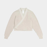 Flat front view of the Oatmeal Kowtow Composure Cardigan showing its wrap front and long sleeves.
