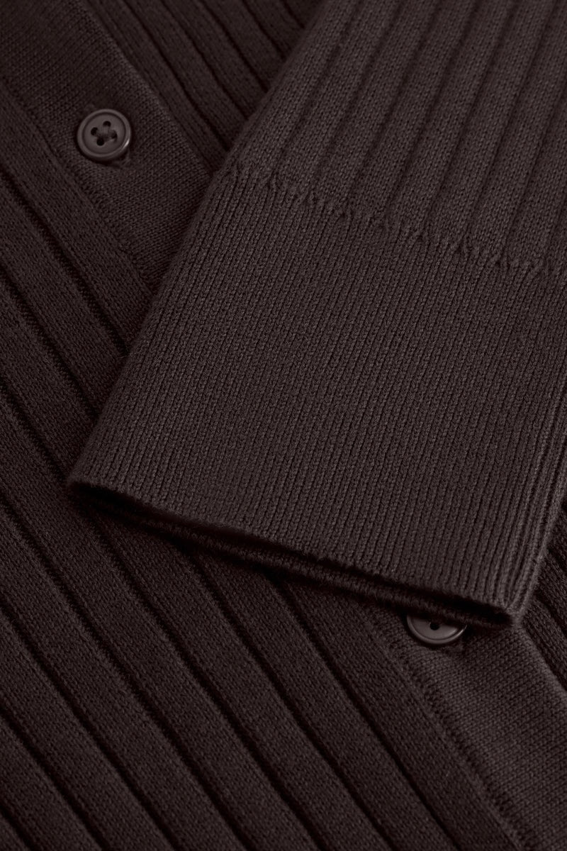 Detail of the Sable Field Cardigan’s rib knit, button and cuff