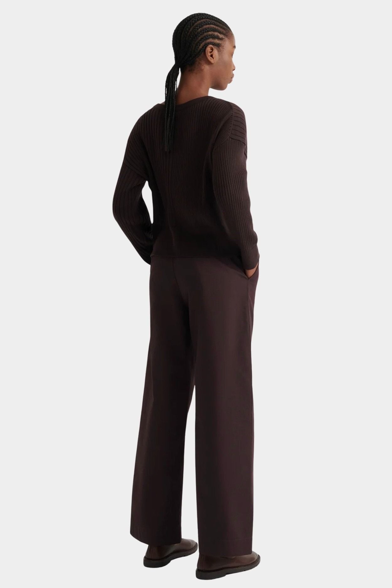 Back view of the Sable Field Cardigan showing the rib knit and relaxed shoulders