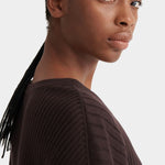 Close view of the Sable Field Cardigan’s ribbed shoulder and dropped seam