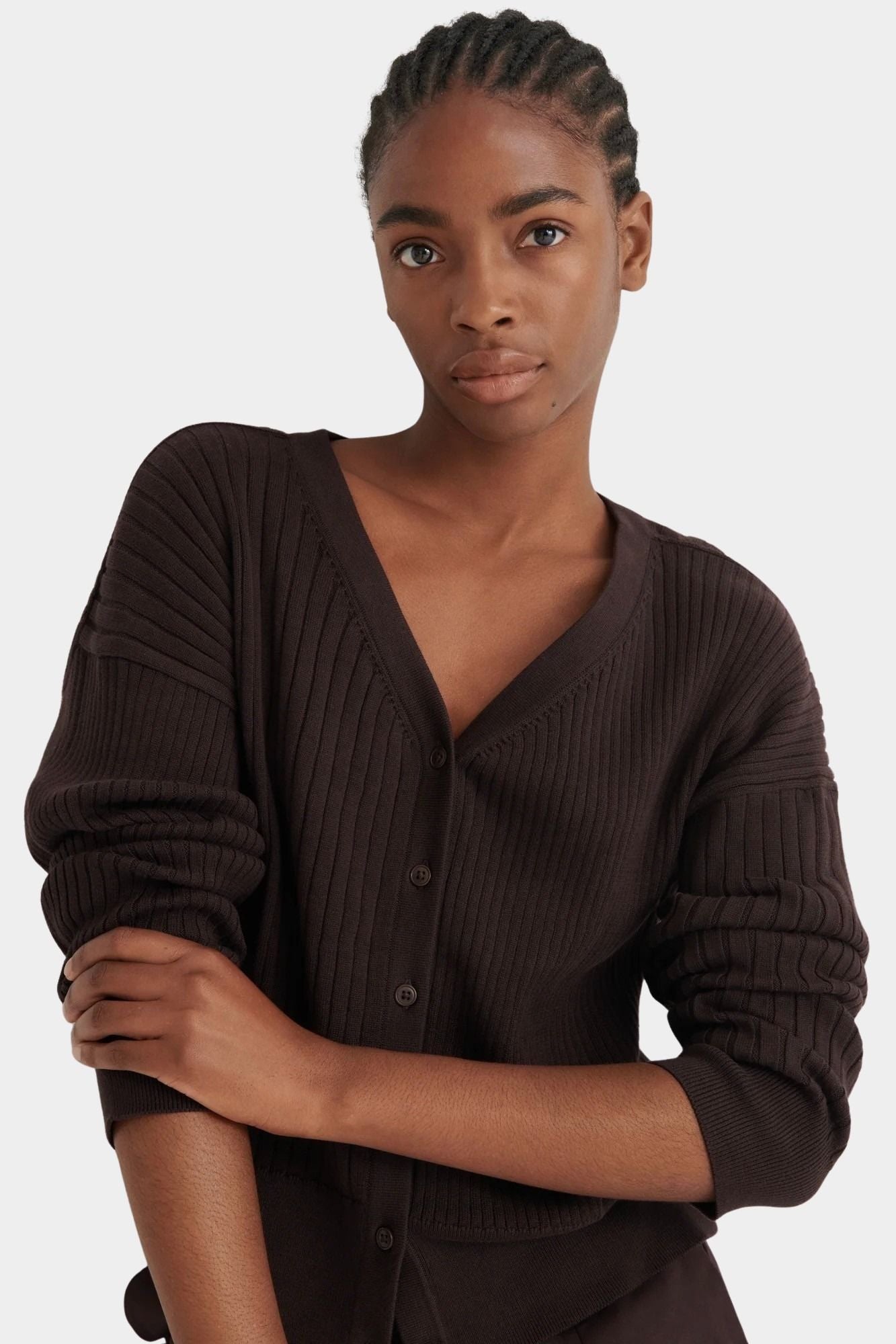 Close view of the Sable Field Cardigan’s ribbed shoulder and dropped seam