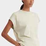 Angled front view of the Stone Kowtow Geometry Tee showing its relaxed shape and extended shoulders