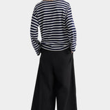 kowtow pierre tee uniform stripe navy ivory striped long sleeve tee back view styled with wide leg trousers
