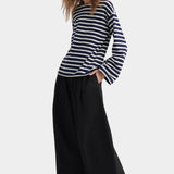 kowtow pierre tee uniform stripe organic cotton striped long sleeve tee relaxed fit worn with wide leg black trousers