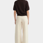 Back view of the Sable Shoreline Tee showing its relaxed shape and ribbed hem
