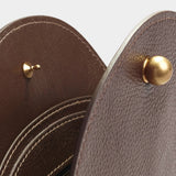 Close view of the LINDQUIST Eggi bag’s interior zippered pocket and spherical brass hardware
