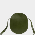 LINDQUIST Eggi bag in Olive with a rounded silhouette, spherical brass snap, and tonal stitching