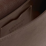 Interior view of the LINDQUIST Mezzo bag in Chaga showing its leather divider and built-in card pocket