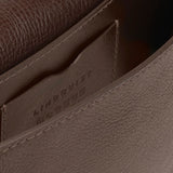 Interior view of the LINDQUIST Mezzo bag in Chaga showing its leather divider and built-in card pocket